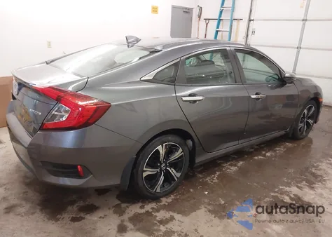 2016 Honda Civic Touring z USA, uszkodzony, nr VIN 19XFC1F92GE039798